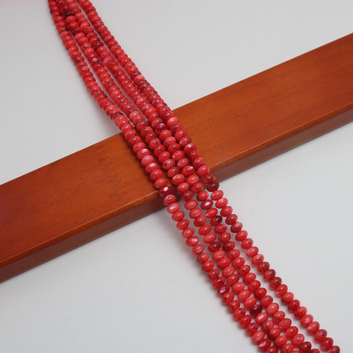 Red 3.5x5mm (about  105 Pc/Strand)