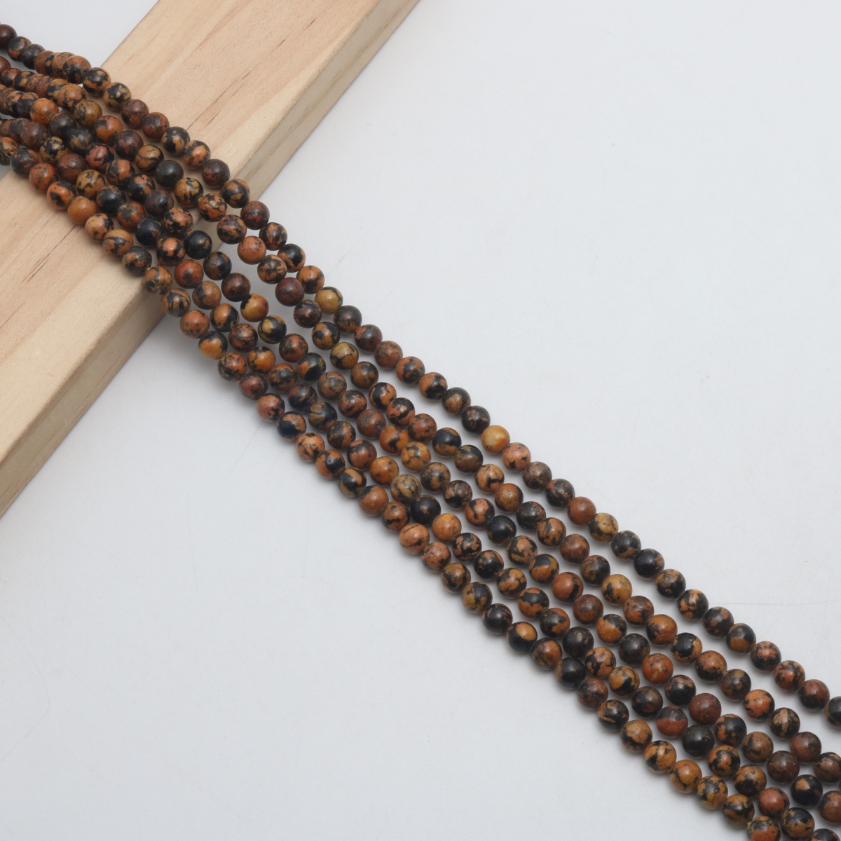 Brown 6mm (about 62 Pc/Strand)