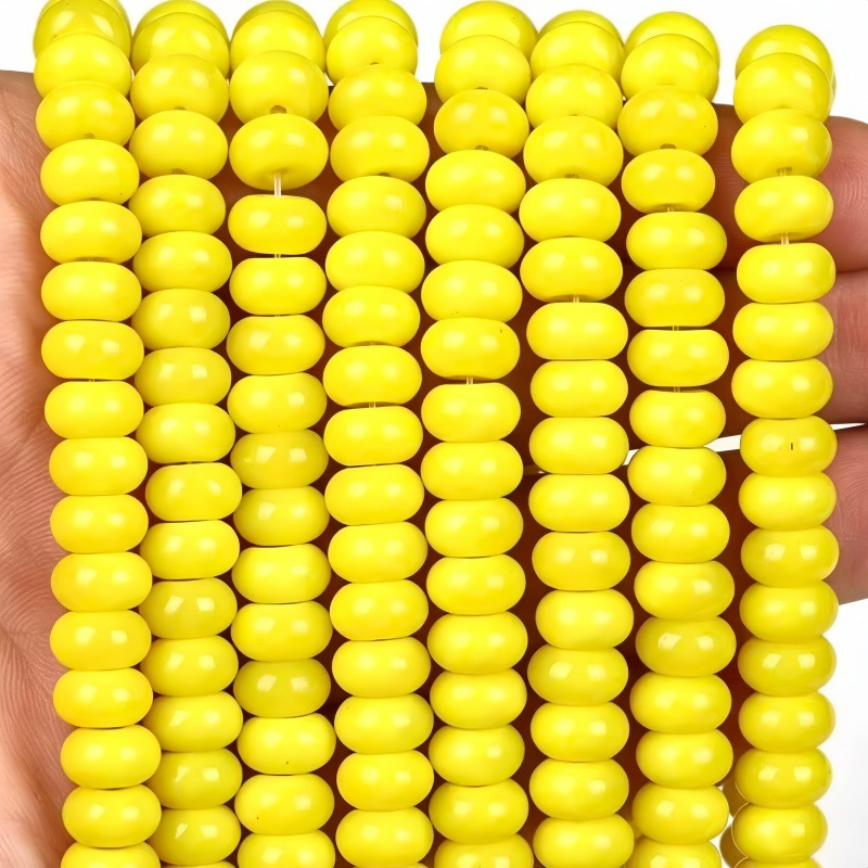 Fluorescent yellow ceramic material